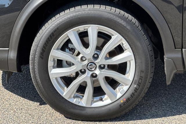 Photo of 2021 Magnetic Black Pearl Nissan Rogue Sport