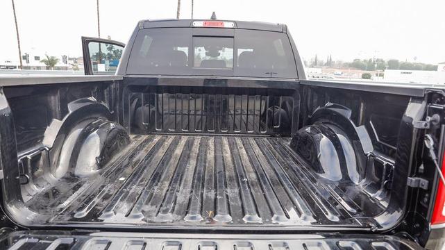 Photo of 2023 Diamond Black Crystal Pearlcoat RAM 1500