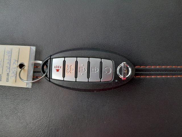 Photo of 2021 Monarch Orange/Super Black Nissan Sentra