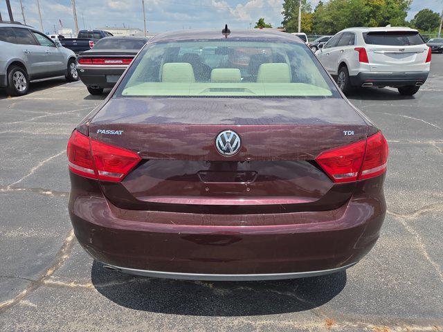 Photo of 2013 Opera Red Metallic Volkswagen Passat