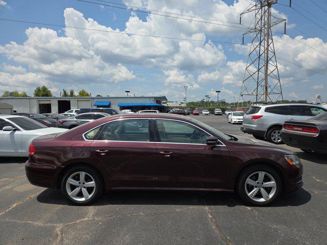 Photo of 2013 Opera Red Metallic Volkswagen Passat