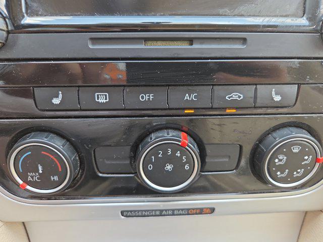 Photo of 2013 Opera Red Metallic Volkswagen Passat