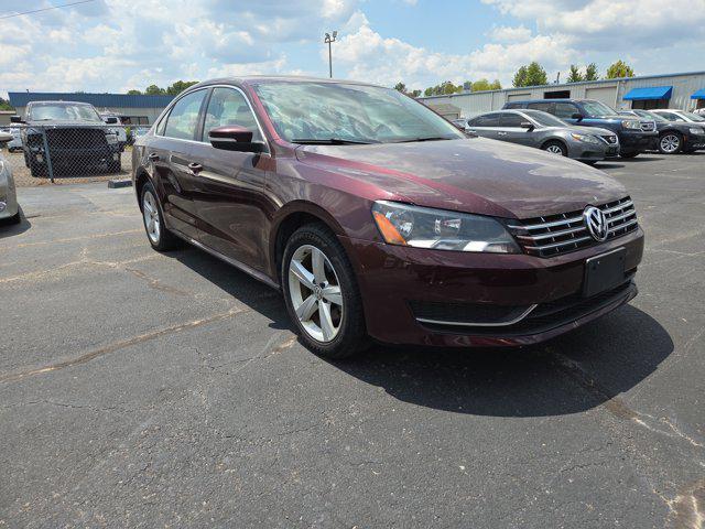 Photo of 2013 Opera Red Metallic Volkswagen Passat