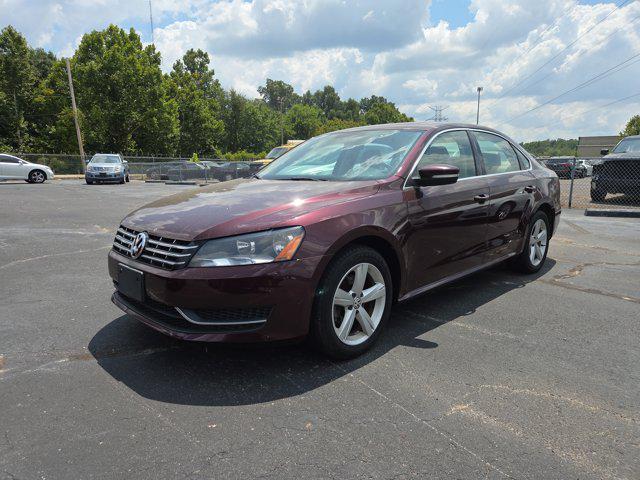 Photo of 2013 Opera Red Metallic Volkswagen Passat