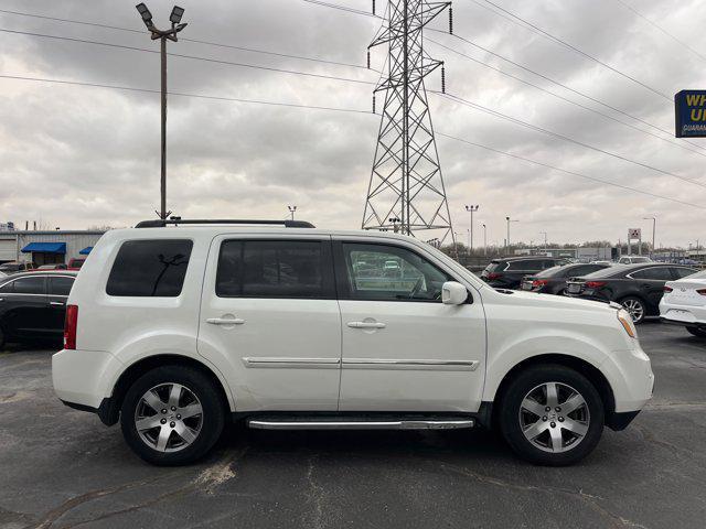 Photo of 2015 White Diamond Pearl Honda Pilot