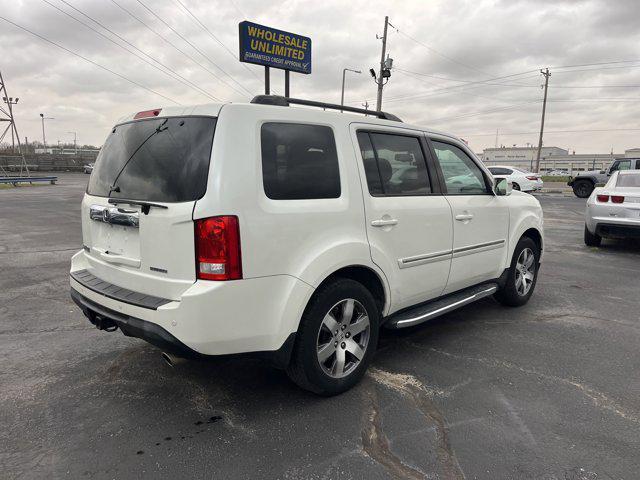 Photo of 2015 White Diamond Pearl Honda Pilot