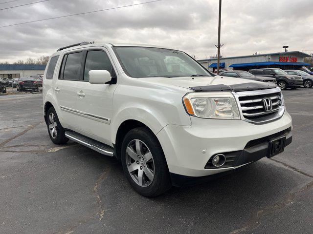 Photo of 2015 White Diamond Pearl Honda Pilot