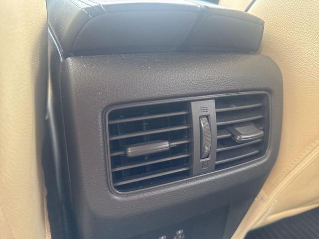 Photo of 2023 Pearl White Tricoat Nissan Rogue