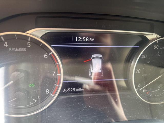 Photo of 2023 Pearl White Tricoat Nissan Rogue