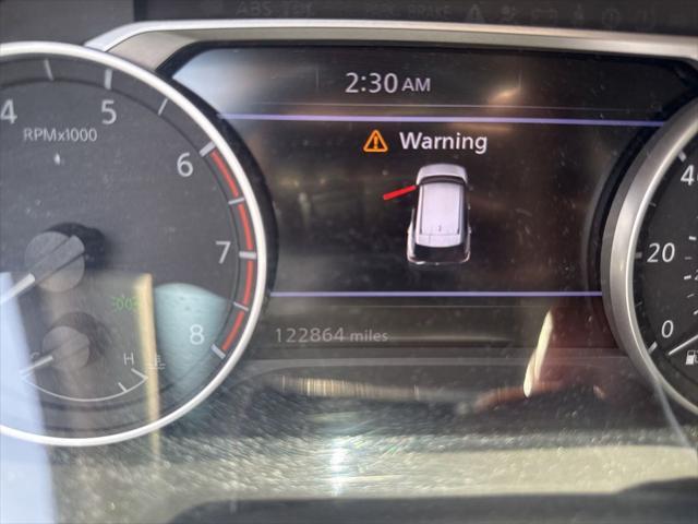 Photo of 2021 Pearl White Tricoat Nissan Rogue