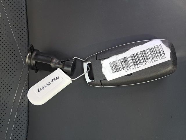 Photo of 2025 Obsidian Green Pearl/Super Black Nissan Pathfinder
