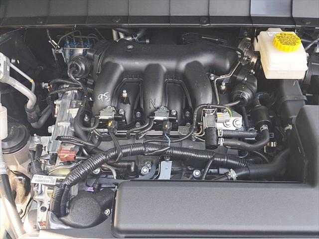Photo of 2025 Obsidian Green Pearl/Super Black Nissan Pathfinder