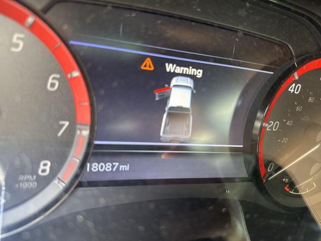 Photo of 2024 Boulder Gray Pearl Nissan Frontier