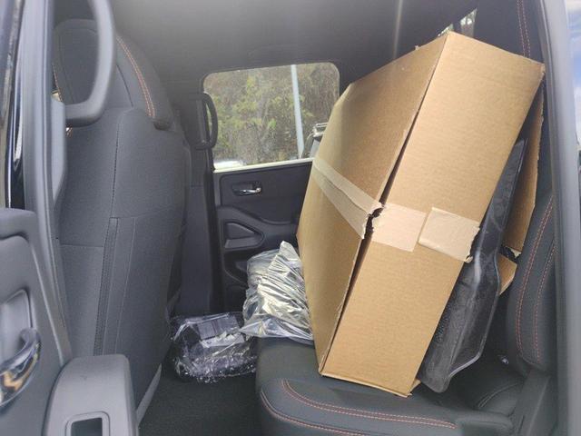Photo of 2025 Super Black Nissan Frontier