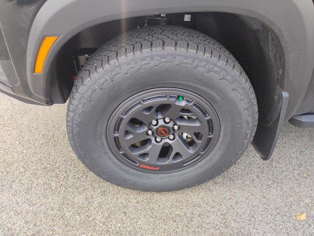 Photo of 2025 Super Black Nissan Frontier