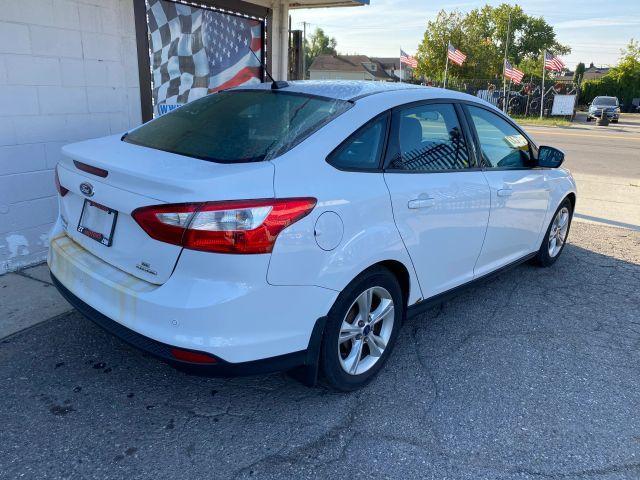 Photo of 2014 White Ford Focus