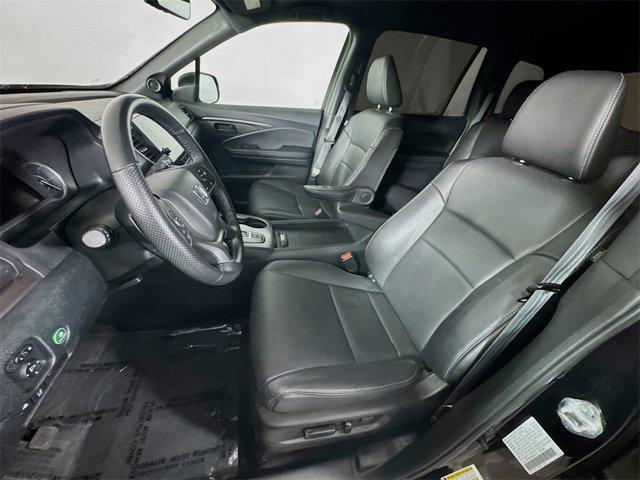 Photo of 2023 Crystal Black Pearl Honda Passport