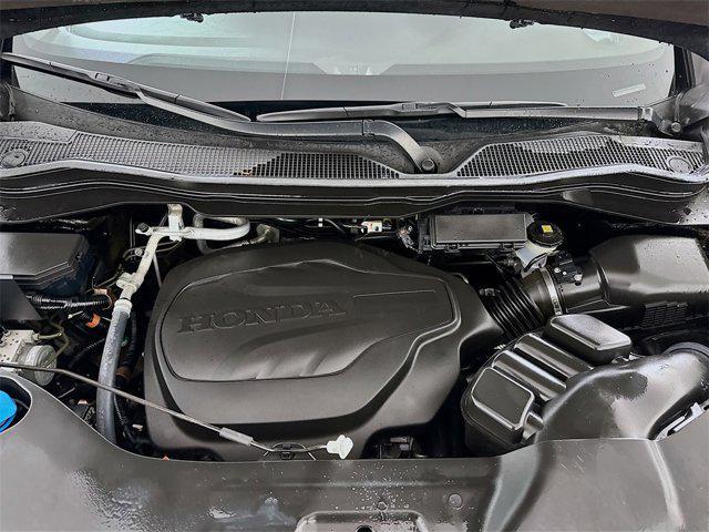 Photo of 2023 Crystal Black Pearl Honda Passport