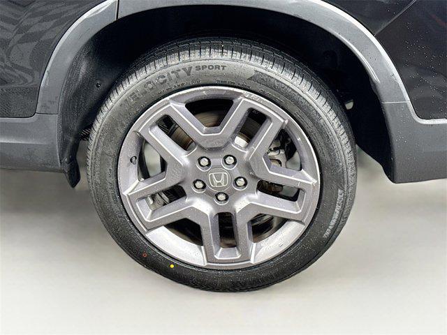 Photo of 2023 Crystal Black Pearl Honda Passport