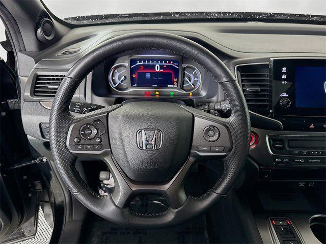 Photo of 2023 Crystal Black Pearl Honda Passport