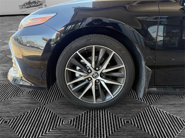 Photo of 2023 Midnight Black Metallic Toyota Camry
