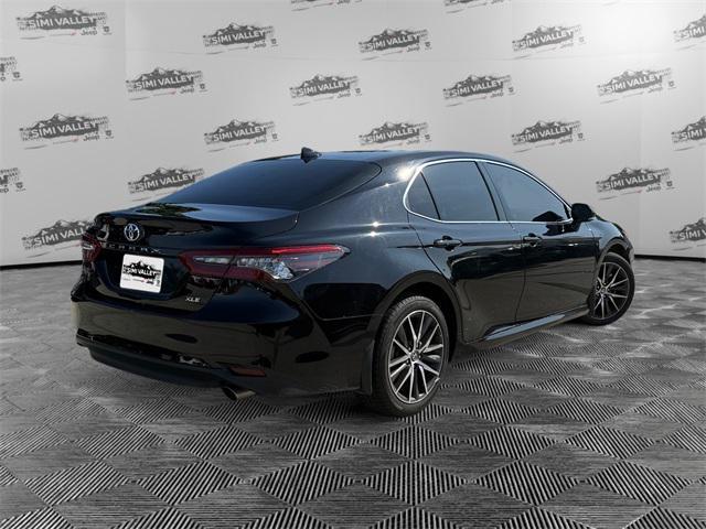 Photo of 2023 Midnight Black Metallic Toyota Camry
