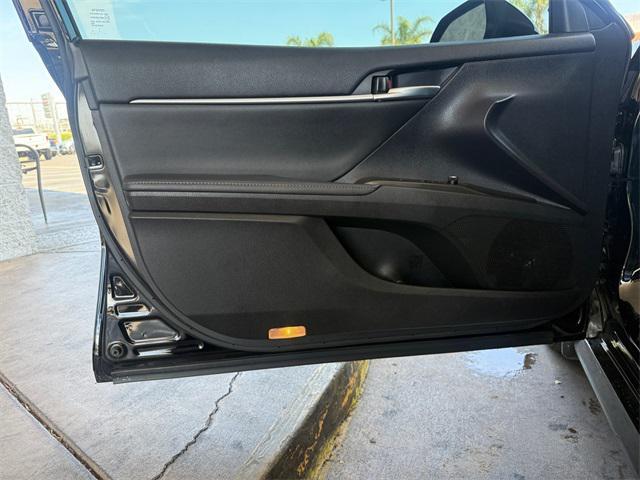 Photo of 2023 Midnight Black Metallic Toyota Camry