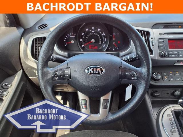 Photo of 2015 Twilight Blue Kia Sportage