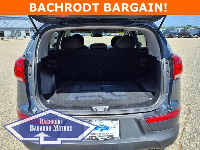 Photo of 2015 Twilight Blue Kia Sportage