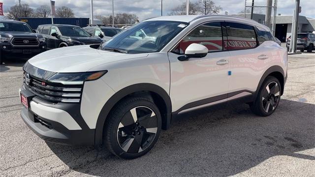Photo of 2025 Aspen White Tricoat Nissan Kicks