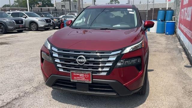 Photo of 2025 Scarlet Ember Tintcoat Nissan Rogue