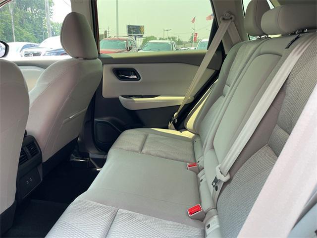 Photo of 2025 Scarlet Ember Tintcoat Nissan Rogue