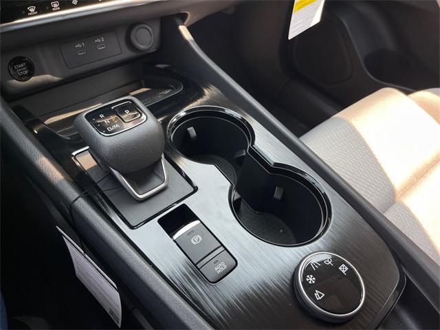 Photo of 2025 Scarlet Ember Tintcoat Nissan Rogue