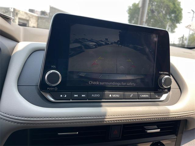 Photo of 2025 Scarlet Ember Tintcoat Nissan Rogue