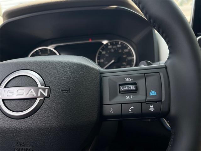 Photo of 2025 Scarlet Ember Tintcoat Nissan Rogue