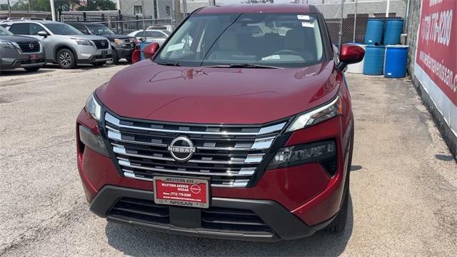 Photo of 2025 Scarlet Ember Tintcoat Nissan Rogue