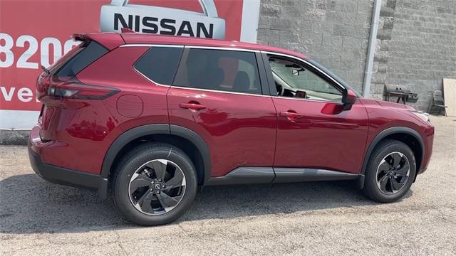 Photo of 2025 Scarlet Ember Tintcoat Nissan Rogue