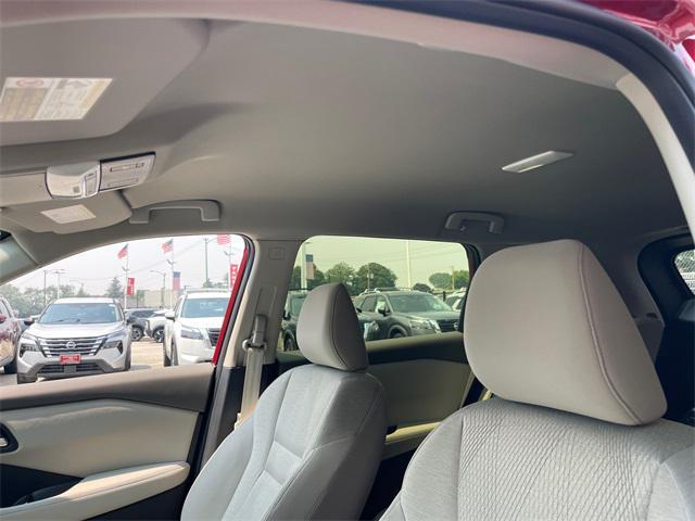 Photo of 2025 Scarlet Ember Tintcoat Nissan Rogue