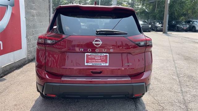 Photo of 2025 Scarlet Ember Tintcoat Nissan Rogue