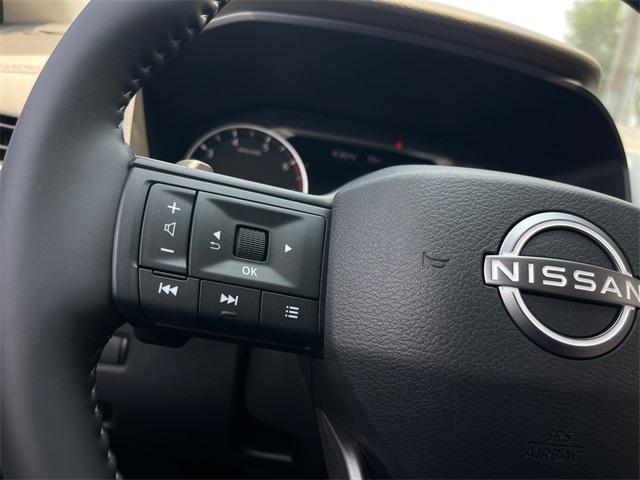 Photo of 2025 Scarlet Ember Tintcoat Nissan Rogue