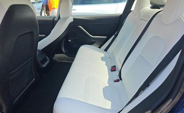 Photo of 2022 Deep Blue Metallic Tesla Model 3