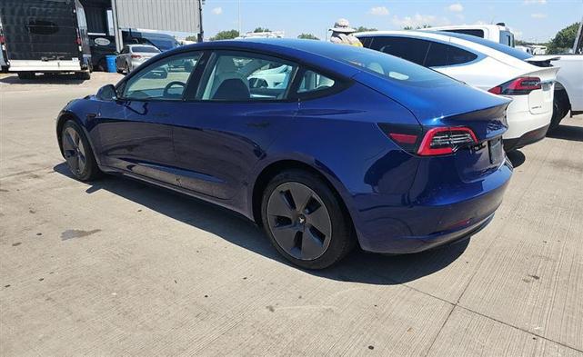 Photo of 2022 Deep Blue Metallic Tesla Model 3