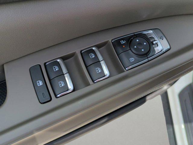 Photo of 2026 Snow White Pearl Kia Carnival Hybrid