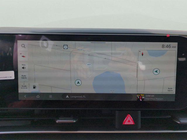 Photo of 2026 Snow White Pearl Kia Carnival Hybrid