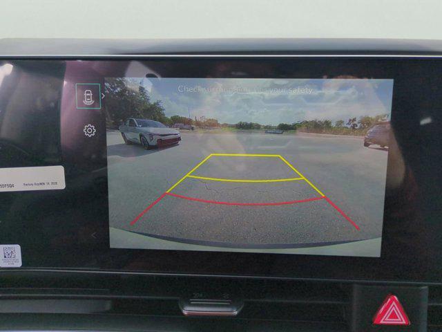 Photo of 2026 Snow White Pearl Kia Carnival Hybrid