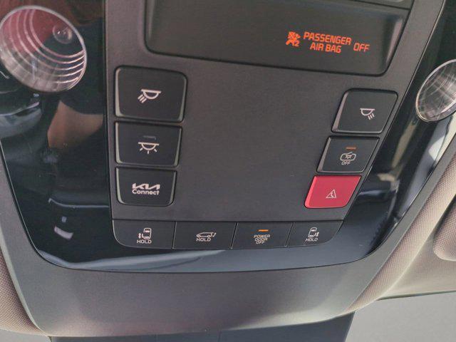 Photo of 2026 Snow White Pearl Kia Carnival Hybrid