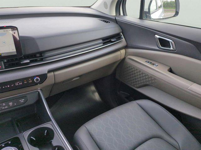 Photo of 2026 Snow White Pearl Kia Carnival Hybrid