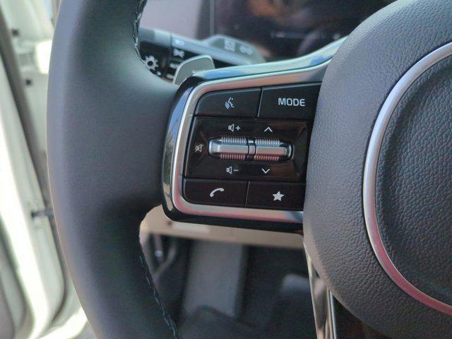 Photo of 2026 Snow White Pearl Kia Carnival Hybrid