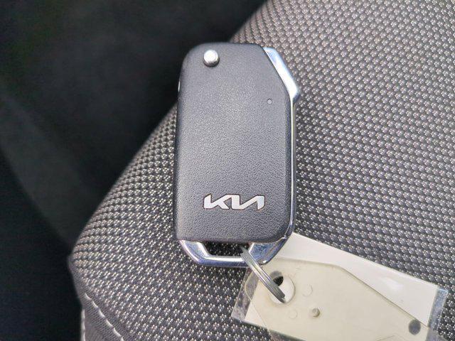 Photo of 2023 Currant Red Kia Forte