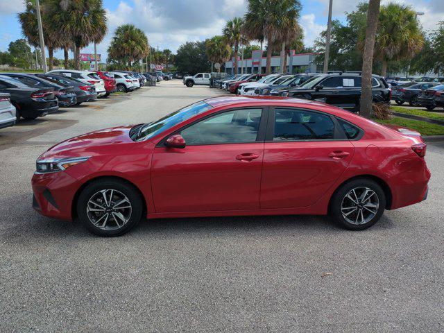 Photo of 2023 Currant Red Kia Forte